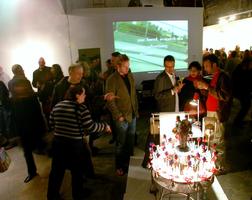 People admiring one of the works.